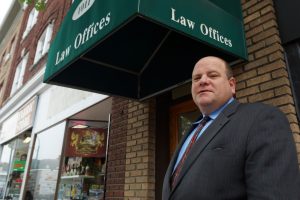 Personal Injury Attroney Robert Nachamie outside of his Peekskill, Ny office